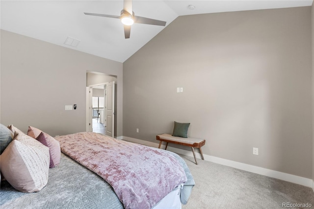 carpeted bedroom with high vaulted ceiling and ceiling fan