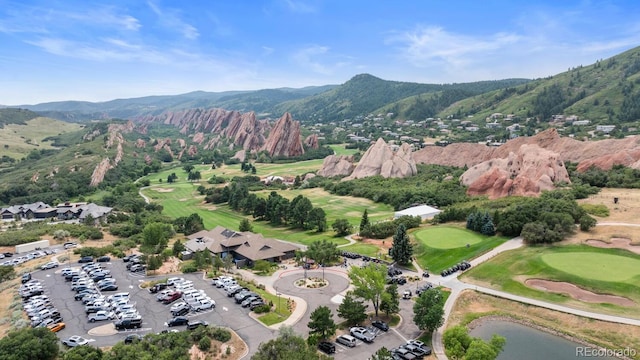 drone / aerial view featuring a mountain view