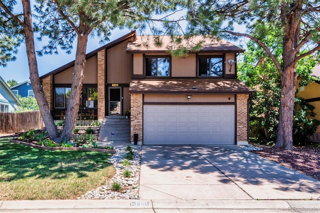 3688 S Cathay Cir, Aurora, CO 80013 - mid-century modern home featuring concrete driveway, a garage, and brick siding