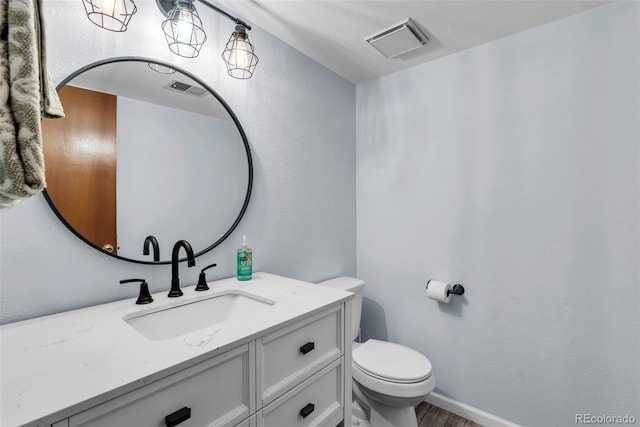 3688 S Cathay Cir, Aurora, CO 80013 - half bath with vanity and wood finished floors