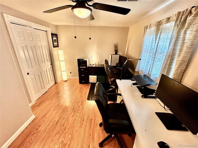 4303 S Yank St, Morrison, CO 80465 - office area with ceiling fan, wood finished floors, and baseboards