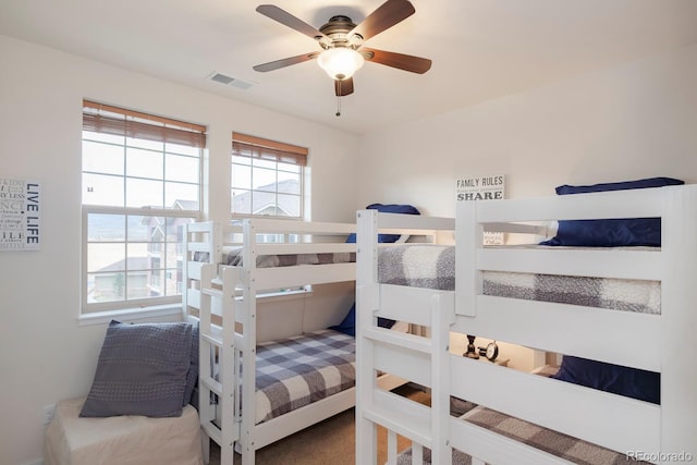 bedroom with carpet and ceiling fan