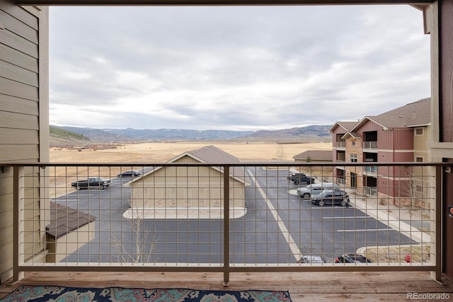 balcony featuring a mountain view