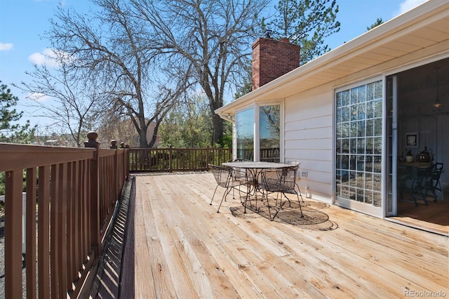 6492 S Piney Creek Cir, Centennial, CO 80016 - wooden deck featuring outdoor dining space