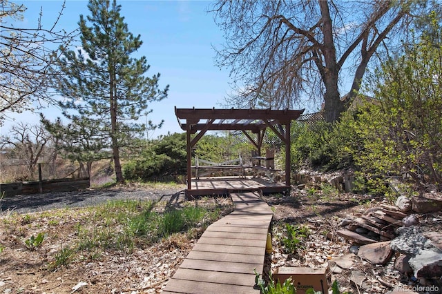 6492 S Piney Creek Cir, Centennial, CO 80016 - view of community featuring a wooden deck and a pergola