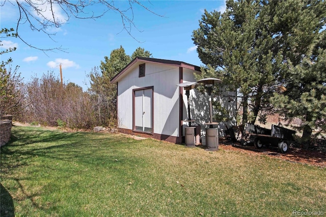 6492 S Piney Creek Cir, Centennial, CO 80016 - exterior space featuring an outdoor structure and a storage shed