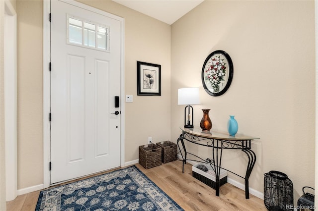 8186 E 53rd Dr, Denver, CO 80238 - entryway with light wood-style flooring and baseboards