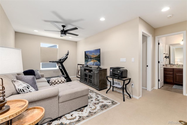 8186 E 53rd Dr, Denver, CO 80238 - living area with a ceiling fan, light colored carpet, and recessed lighting