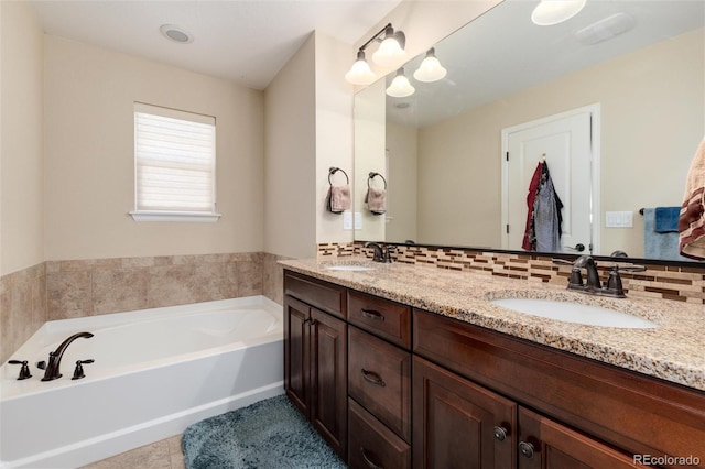8186 E 53rd Dr, Denver, CO 80238 - full bathroom with double vanity, a bath, and tile patterned floors