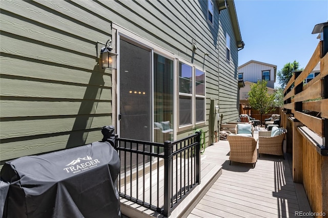 8186 E 53rd Dr, Denver, CO 80238 - wooden terrace with outdoor dining area and area for grilling