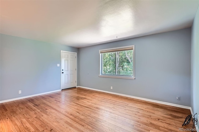 2497 S Race St, Denver, CO 80210 - unfurnished room with light wood-style flooring and baseboards