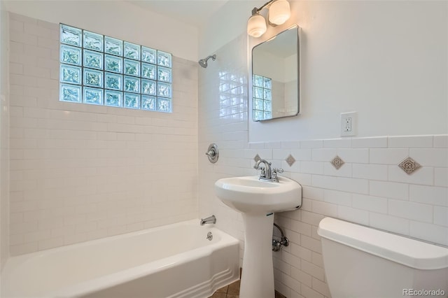 2497 S Race St, Denver, CO 80210 - full bathroom with washtub / shower combination and tile walls
