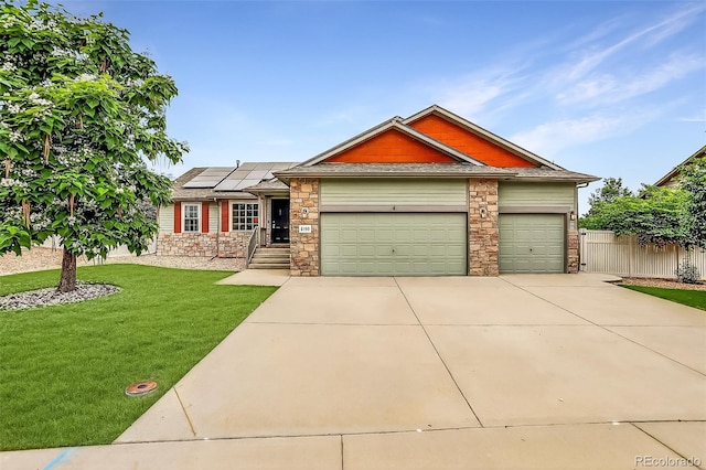5193 Rustic Ave, Firestone, CO 80504 - ranch-style home with stone siding, an attached garage, driveway, and roof mounted solar panels