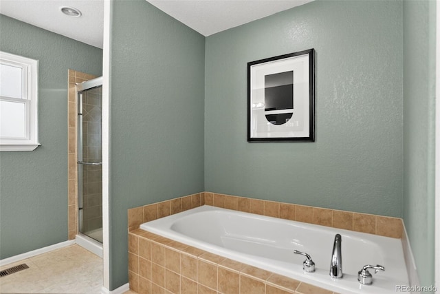 5193 Rustic Ave, Firestone, CO 80504 - full bath with a bath, a stall shower, and a textured wall