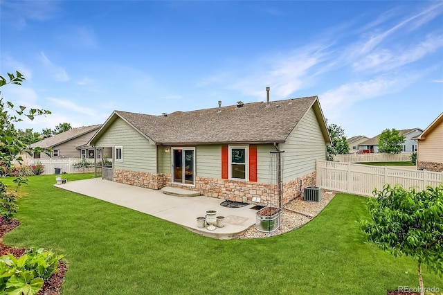 5193 Rustic Ave, Firestone, CO 80504 - rear view of house with a patio area, stone siding, and a shingled roof