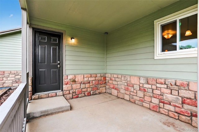 5193 Rustic Ave, Firestone, CO 80504 - view of exterior entry featuring stone siding