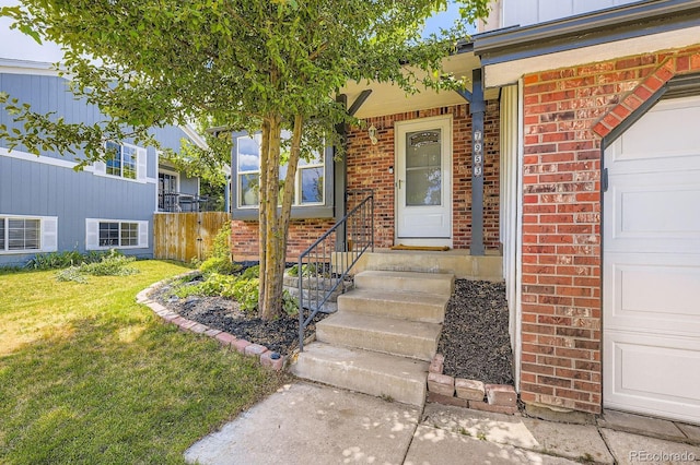 7953 S Garrison Way, Littleton, CO 80128 - entrance to property with brick siding