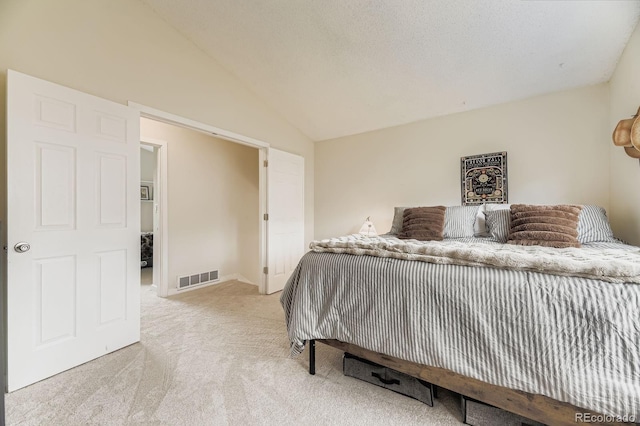 7953 S Garrison Way, Littleton, CO 80128 - bedroom featuring light carpet and lofted ceiling