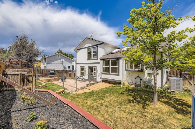 7953 S Garrison Way, Littleton, CO 80128 - rear view of house with stucco siding, a fenced backyard, a patio area, and a shingled roof
