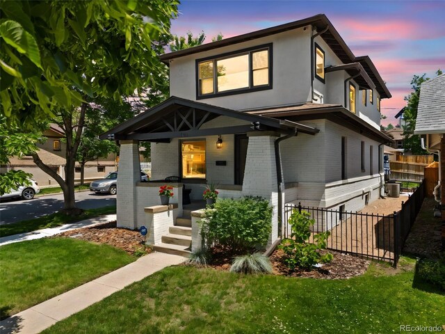 400 S Gilpin St, Denver, CO 80209 - view of front of property with covered porch, brick siding, and stucco siding