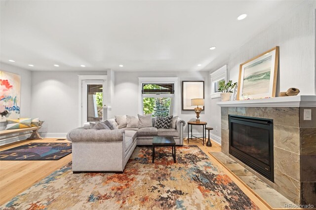 400 S Gilpin St, Denver, CO 80209 - living area featuring recessed lighting, wood finished floors, and a tile fireplace