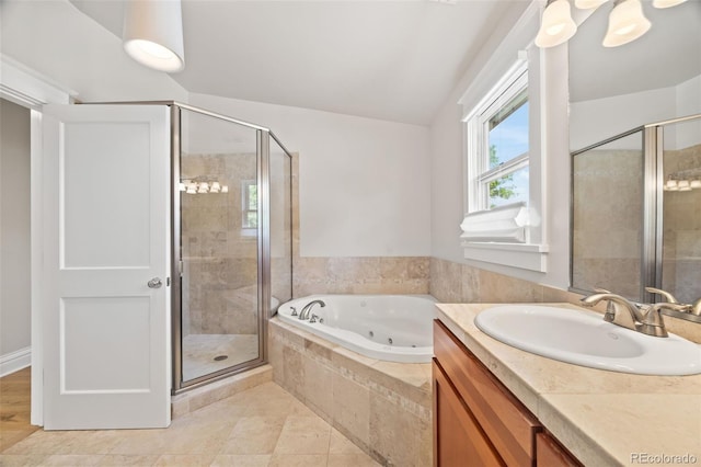 400 S Gilpin St, Denver, CO 80209 - full bathroom with a jetted tub, a stall shower, vanity, and tile patterned floors