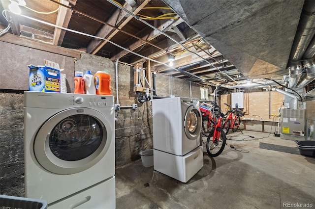 400 S Gilpin St, Denver, CO 80209 - laundry area featuring tankless water heater, washer and dryer, and heating unit