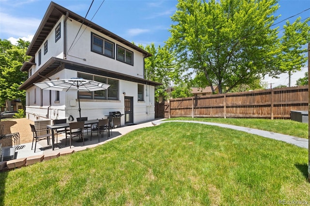 400 S Gilpin St, Denver, CO 80209 - rear view of property with a patio and stucco siding