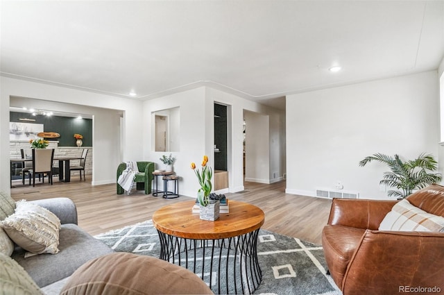 1155 W 4th Ave, Broomfield, CO 80020 - living room with wood finished floors, baseboards, and recessed lighting