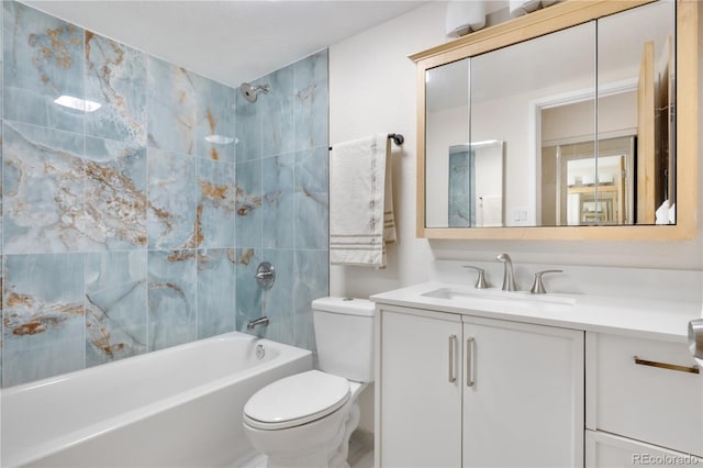 bathroom with toilet, shower / bathing tub combination, and vanity
