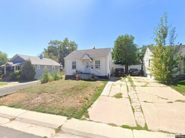 1566 W Nevada Pl, Denver, CO 80223 - bungalow-style home with driveway