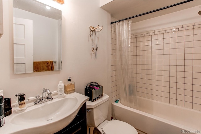 full bathroom with toilet, vanity, and shower / bathtub combination with curtain