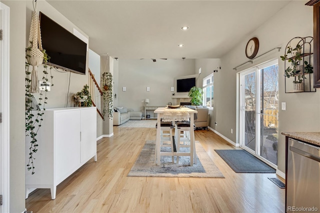 dining area with light hardwood / wood-style floors