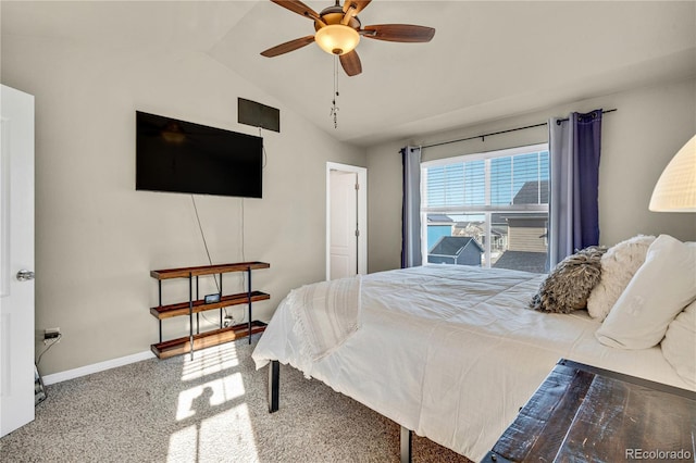 carpeted bedroom with lofted ceiling and ceiling fan