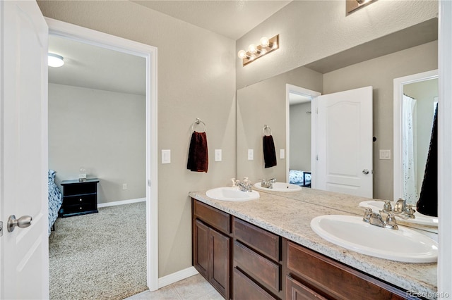 bathroom featuring vanity and tile patterned flooring