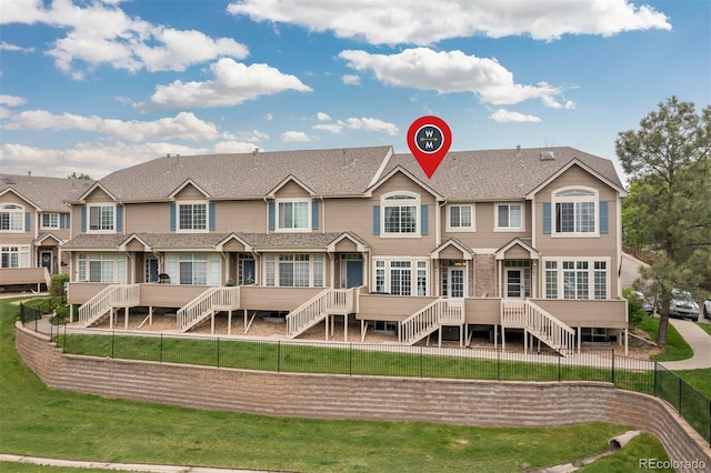 5555 E Briarwood Ave Unit 1404, Centennial, CO 80122 - rear view of property with stairs and roof with shingles