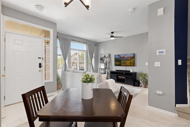 5555 E Briarwood Ave Unit 1404, Centennial, CO 80122 - dining space featuring a ceiling fan and baseboards