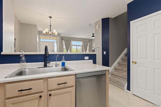 5555 E Briarwood Ave Unit 1404, Centennial, CO 80122 - kitchen featuring dishwasher, a sink, a chandelier, light wood-type flooring, and light countertops