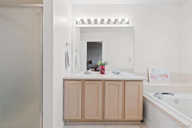 5555 E Briarwood Ave Unit 1404, Centennial, CO 80122 - bathroom with a stall shower, a garden tub, and double vanity