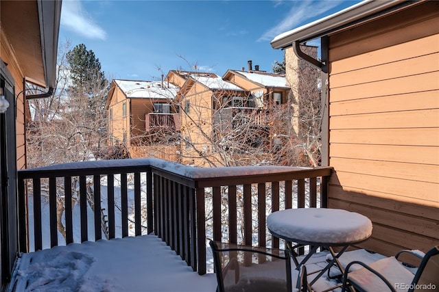 view of snow covered deck