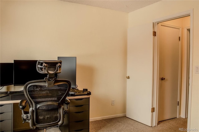 office space with light colored carpet and baseboards