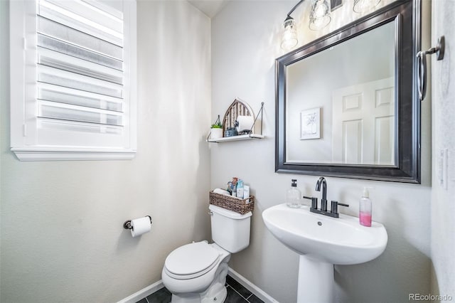 21502 E Idyllwilde Dr, Parker, CO 80138 - bathroom featuring toilet and tile patterned flooring