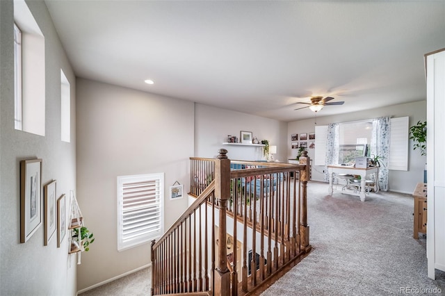 21502 E Idyllwilde Dr, Parker, CO 80138 - hall with carpet floors, an upstairs landing, and recessed lighting