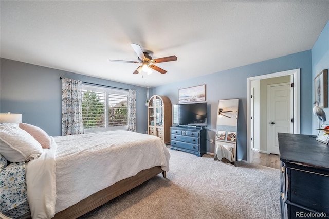 21502 E Idyllwilde Dr, Parker, CO 80138 - carpeted bedroom with a ceiling fan and baseboards