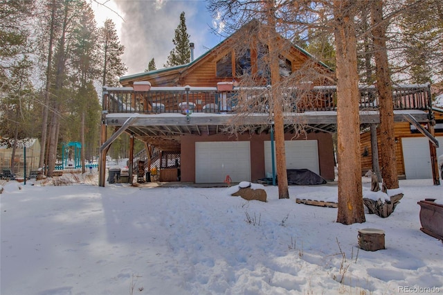 view of front of home featuring a wooden deck