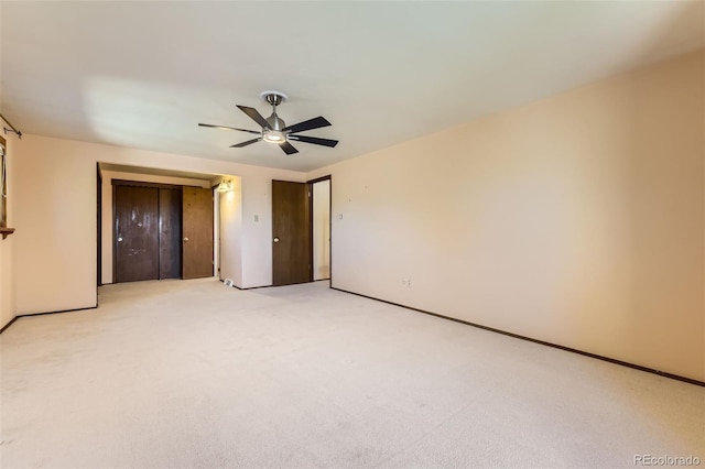 6708 W Portland Ave, Littleton, CO 80128 - unfurnished bedroom with light carpet, ceiling fan, a closet, and baseboards