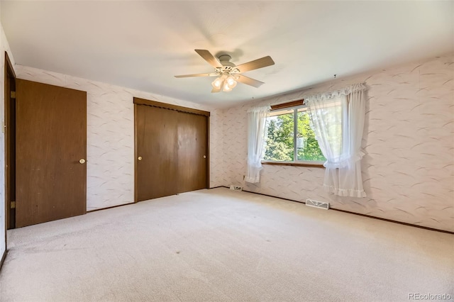 6708 W Portland Ave, Littleton, CO 80128 - unfurnished bedroom with carpet floors and ceiling fan