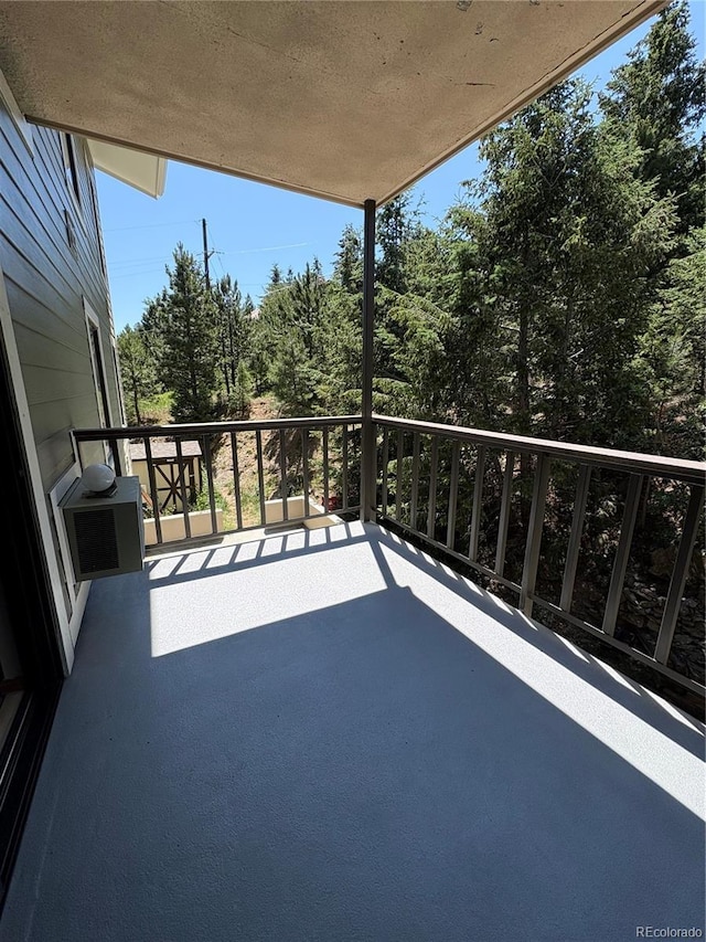 31270 John Wallace Rd Unit 306, Evergreen, CO 80439 - balcony featuring view of scattered trees