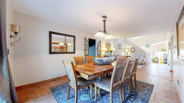 dining space with light tile patterned flooring