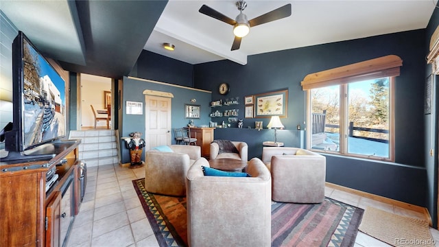 living room with ceiling fan, light tile patterned floors, and lofted ceiling with beams